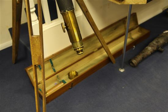 A large brass and leather covered telescope by H.Hughes & Son, 5ft 3in.